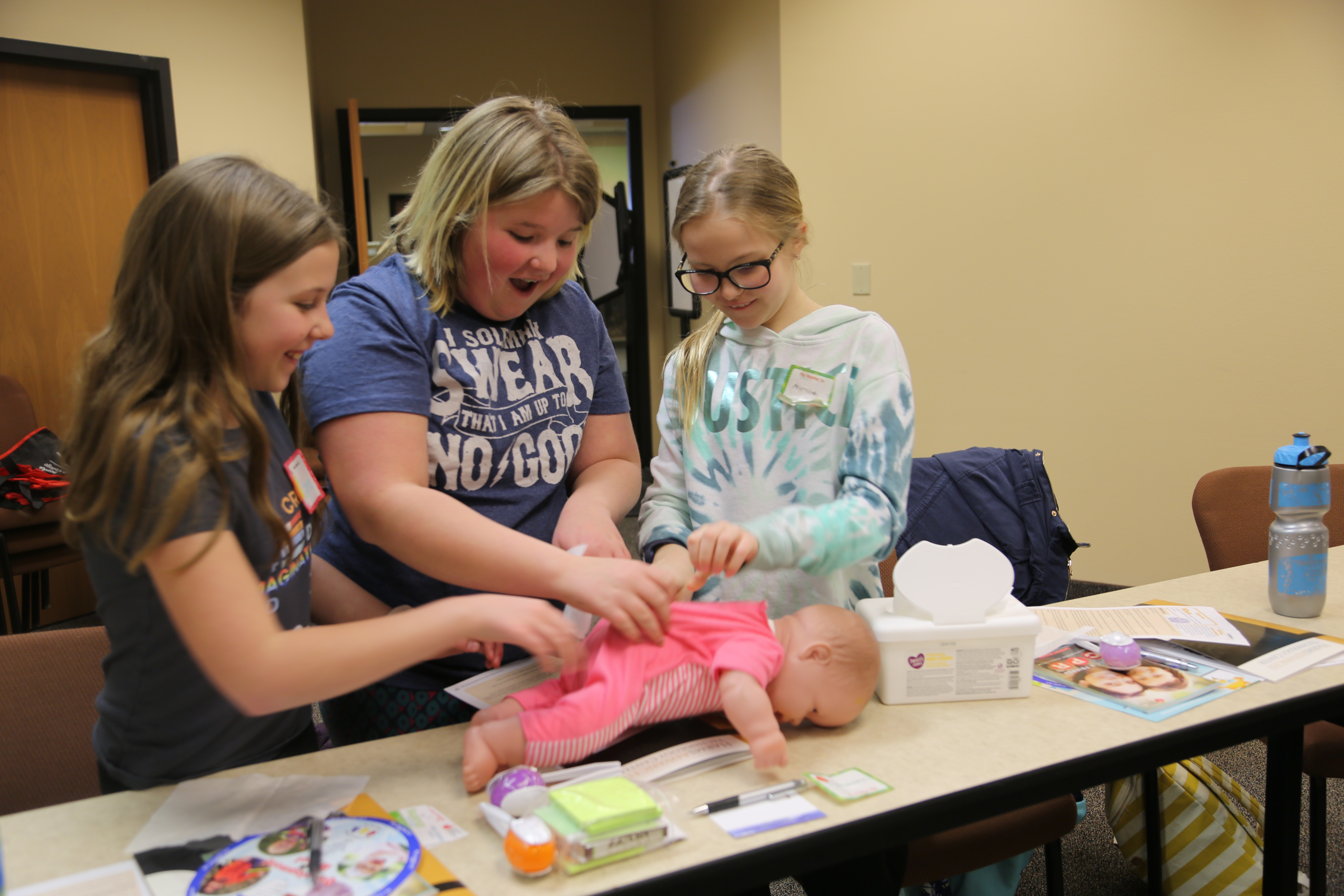 Local youth participate in a baby sitting course